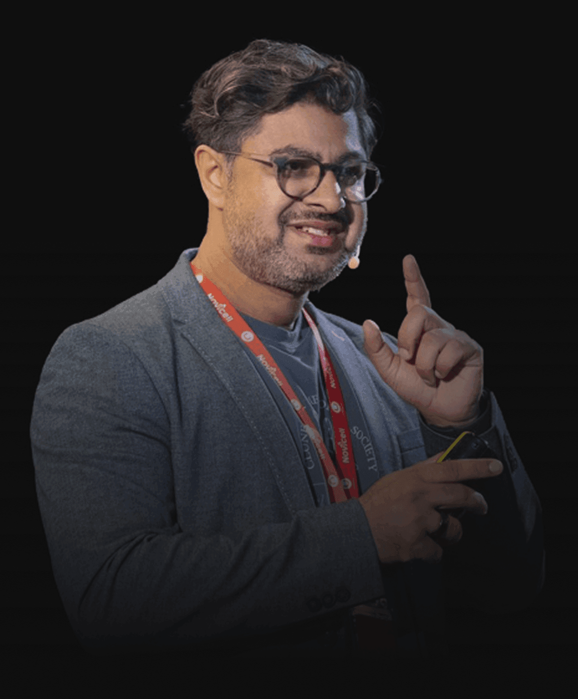 Ash Ali pointing up and presenting