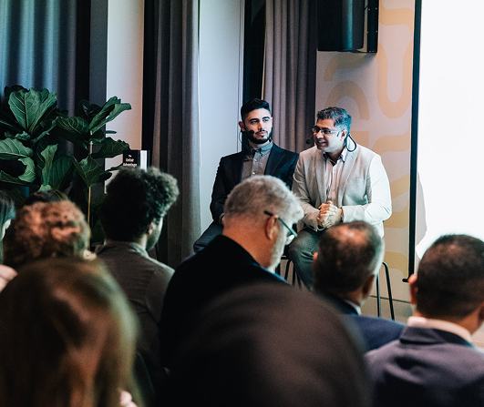 Ash Ali speaking interactively directly with an audience panel